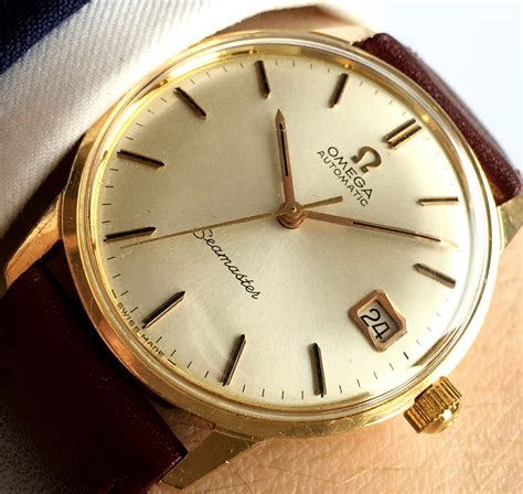 omega watch solid gold